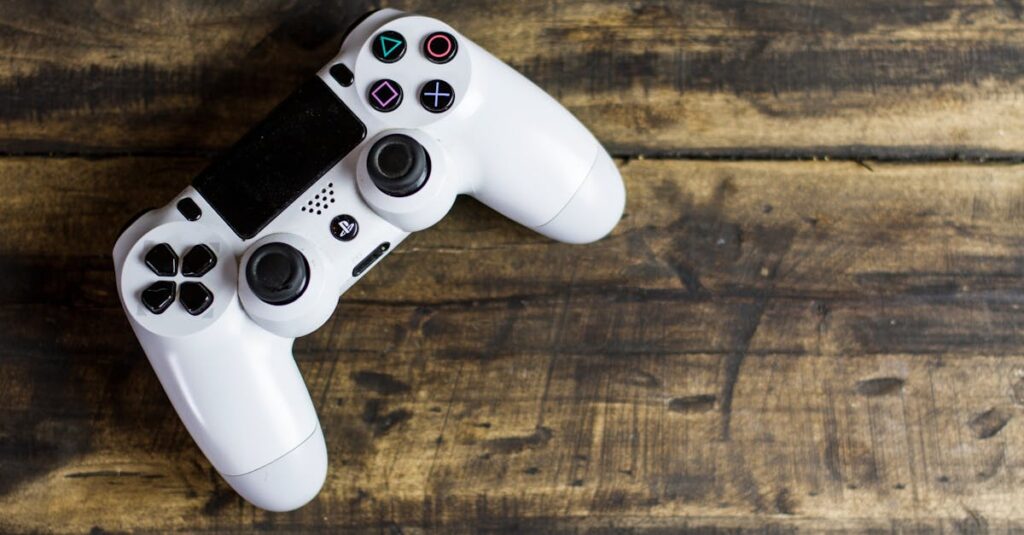 White game controller resting on a rustic wooden surface, top view.